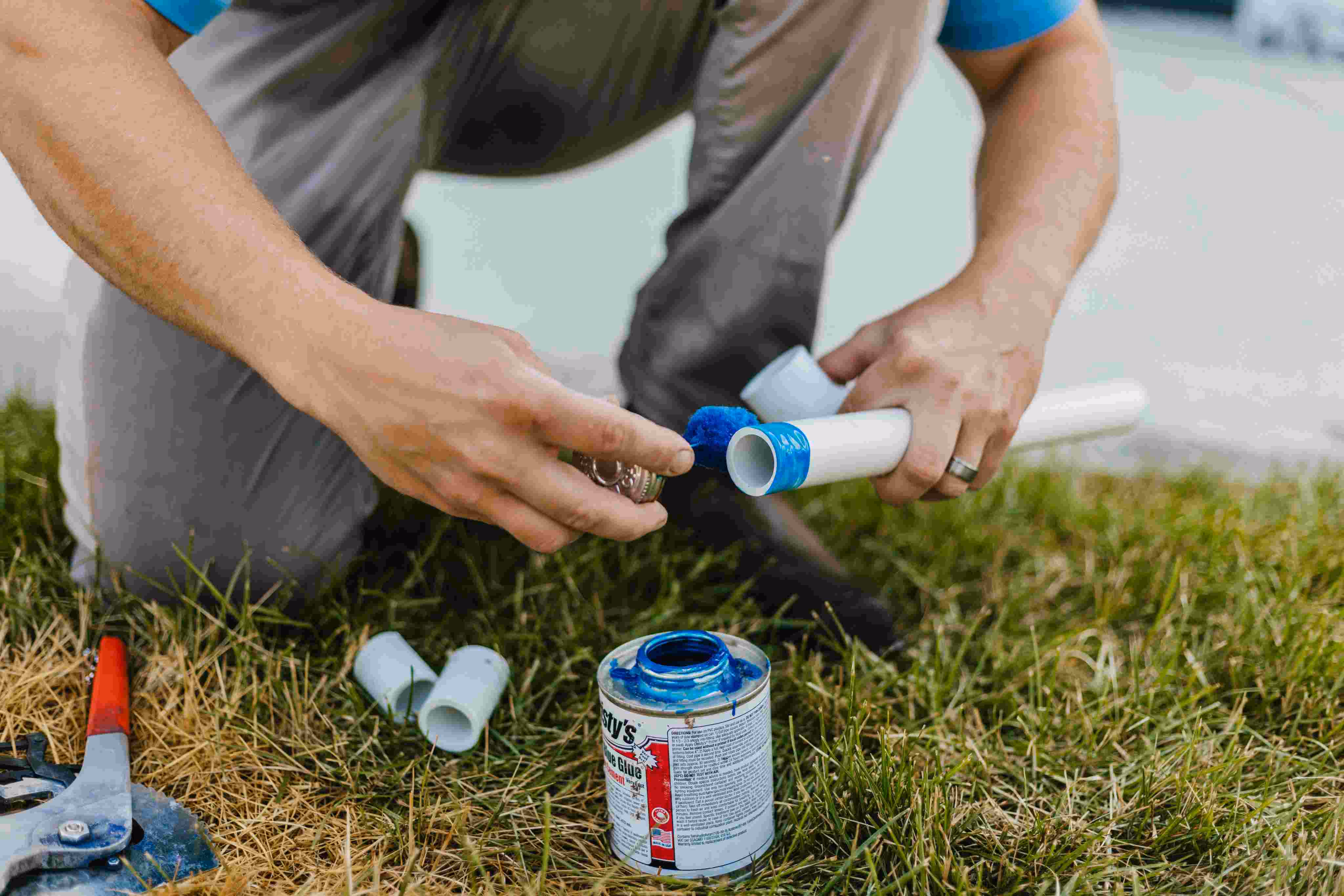 Storm Sprinklers technician installing sprinkler system - Utah sprinkler cost guide