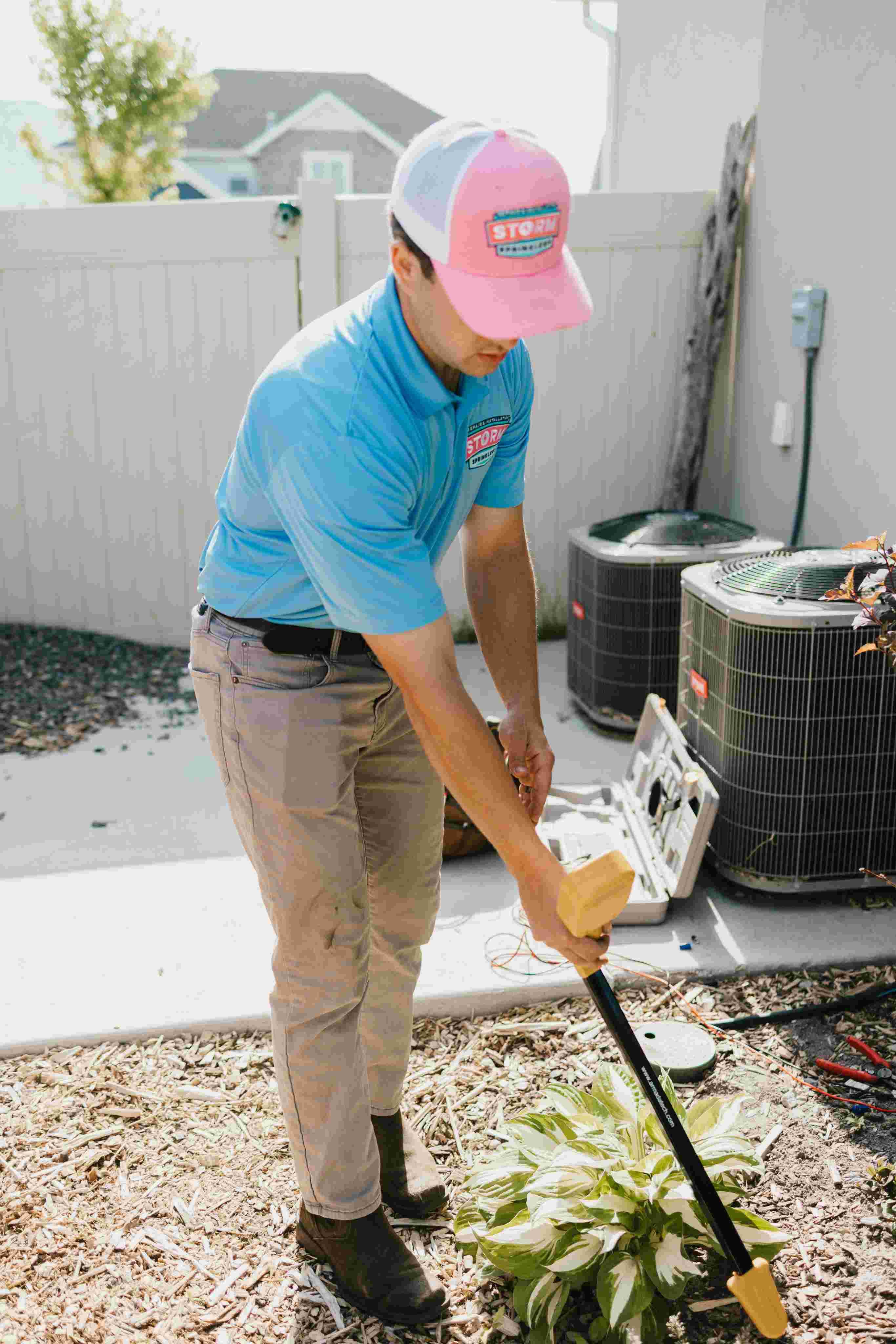 Storm Sprinklers technician locating sprinkler valves with professional equipment in Utah